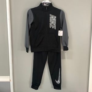 Nike track suit 2 piece youth black and grey size 6